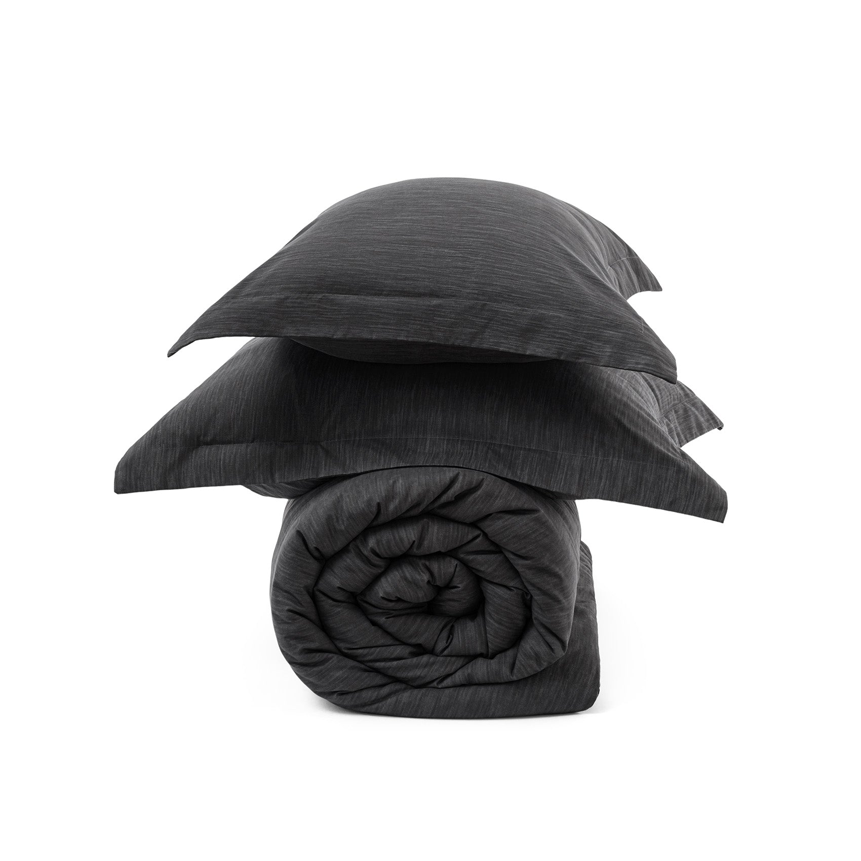 Dark gray GentleSoft comforter set, includes rolled comforter and two pillow shams with dual-tone texture.