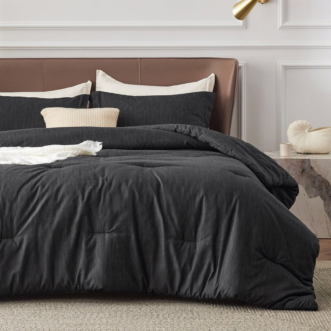 Dark gray GentleSoft comforter set, includes rolled comforter and two pillow shams with dual-tone texture.
