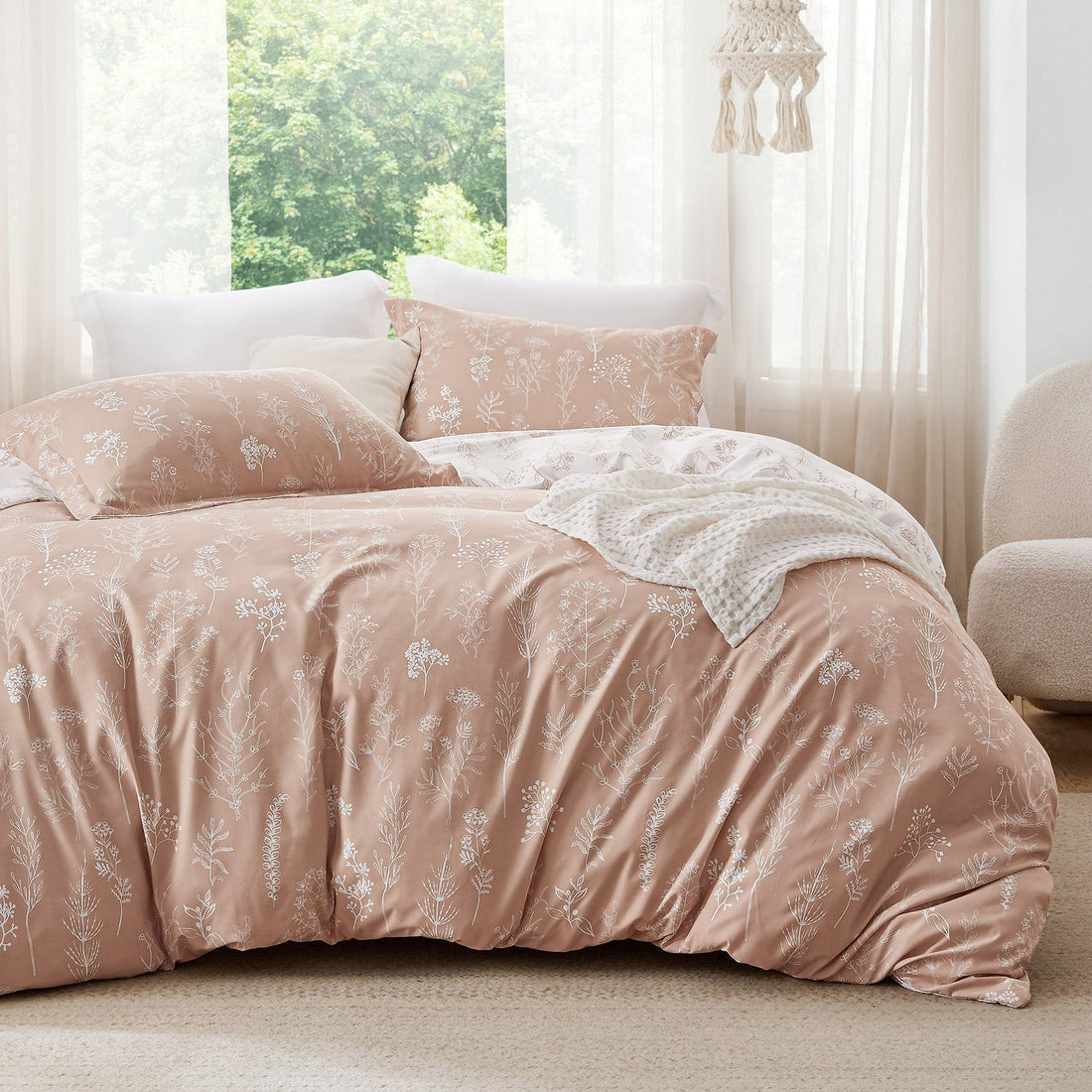 GentleSoft Floral Comforter Set with delicate white botanical print on peach background, includes comforter and two shams.