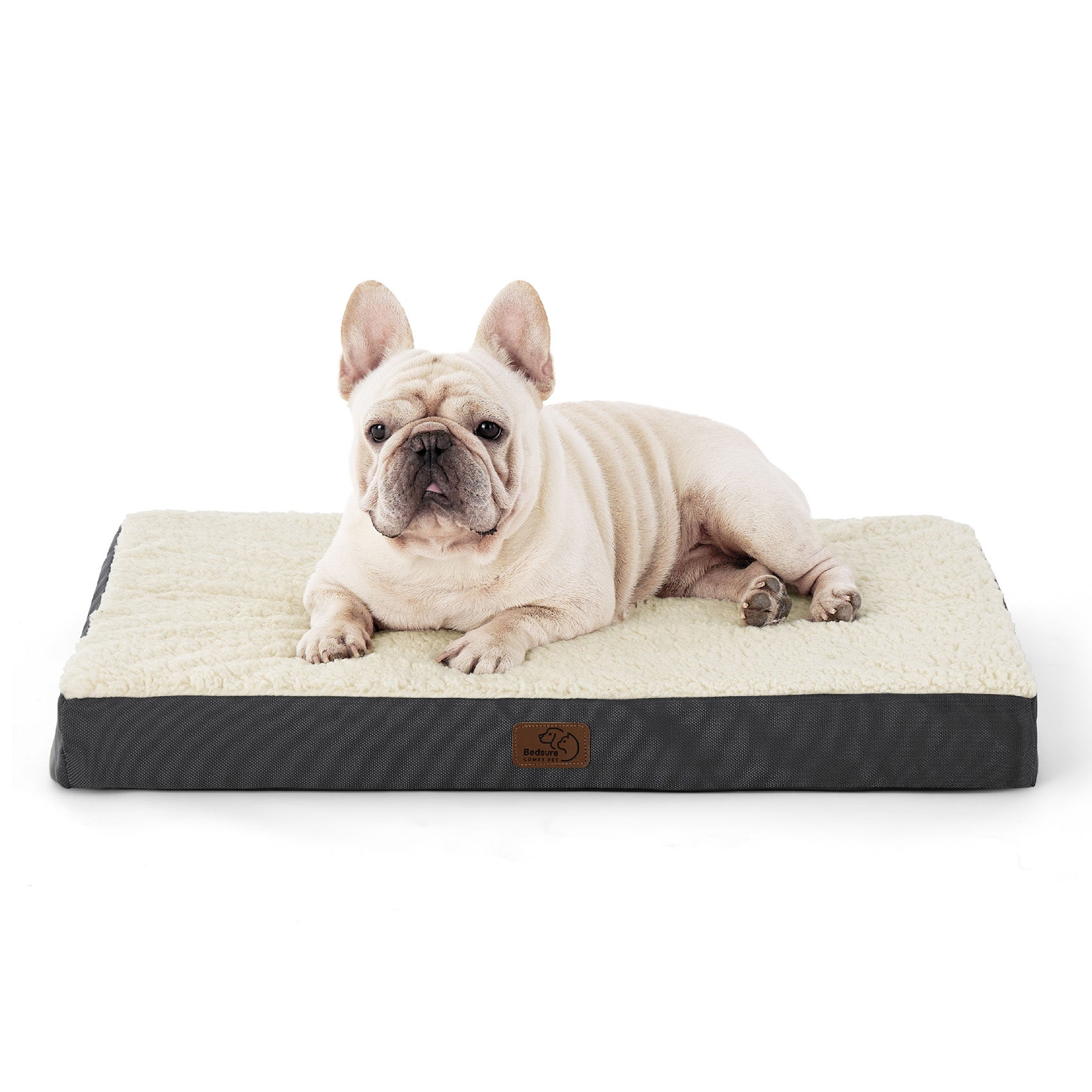 Large orthopedic dog bed with cream Sherpa top and gray base, featuring a cream French Bulldog relaxing comfortably.