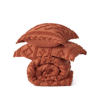 GentleSoft Boho Deluxe Comforter Set in burnt orange with embroidered tufting, includes comforter and two shams.