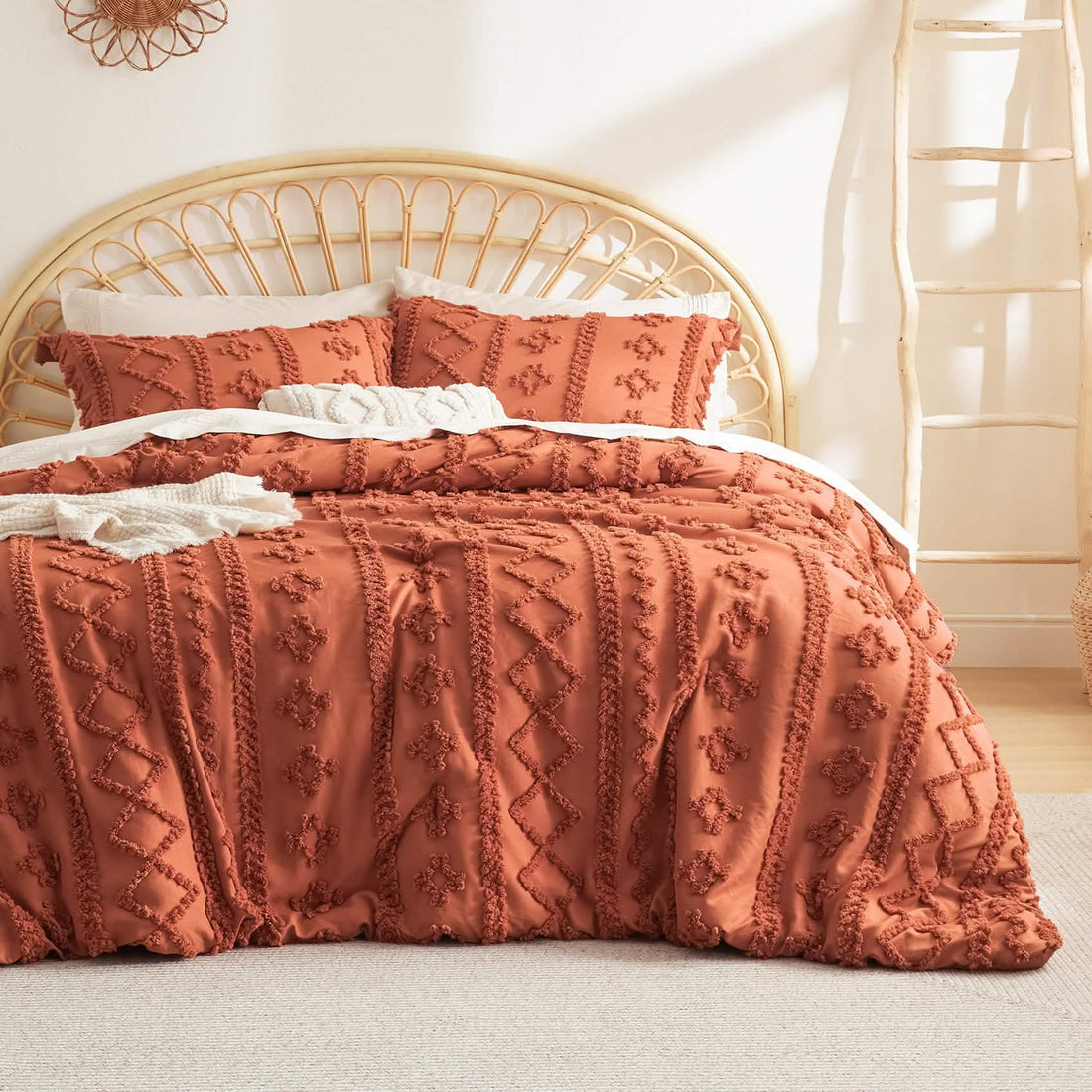 GentleSoft Boho Deluxe Comforter Set in burnt orange with embroidered tufting, includes comforter and two shams.