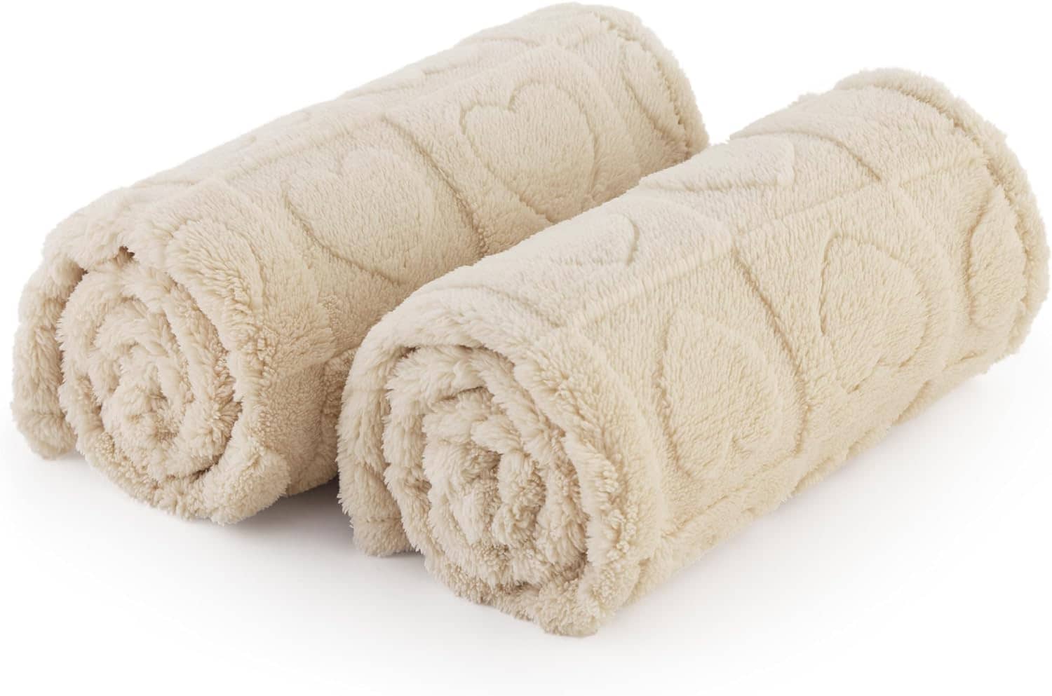 Rolled beige Jacquard fleece pet blankets, heart pattern, plush texture, soft for furniture protection.