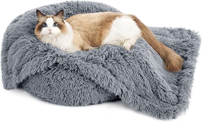 Ragdoll cat resting on plush dark grey shaggy waterproof pet blanket, showcasing comfort and texture.