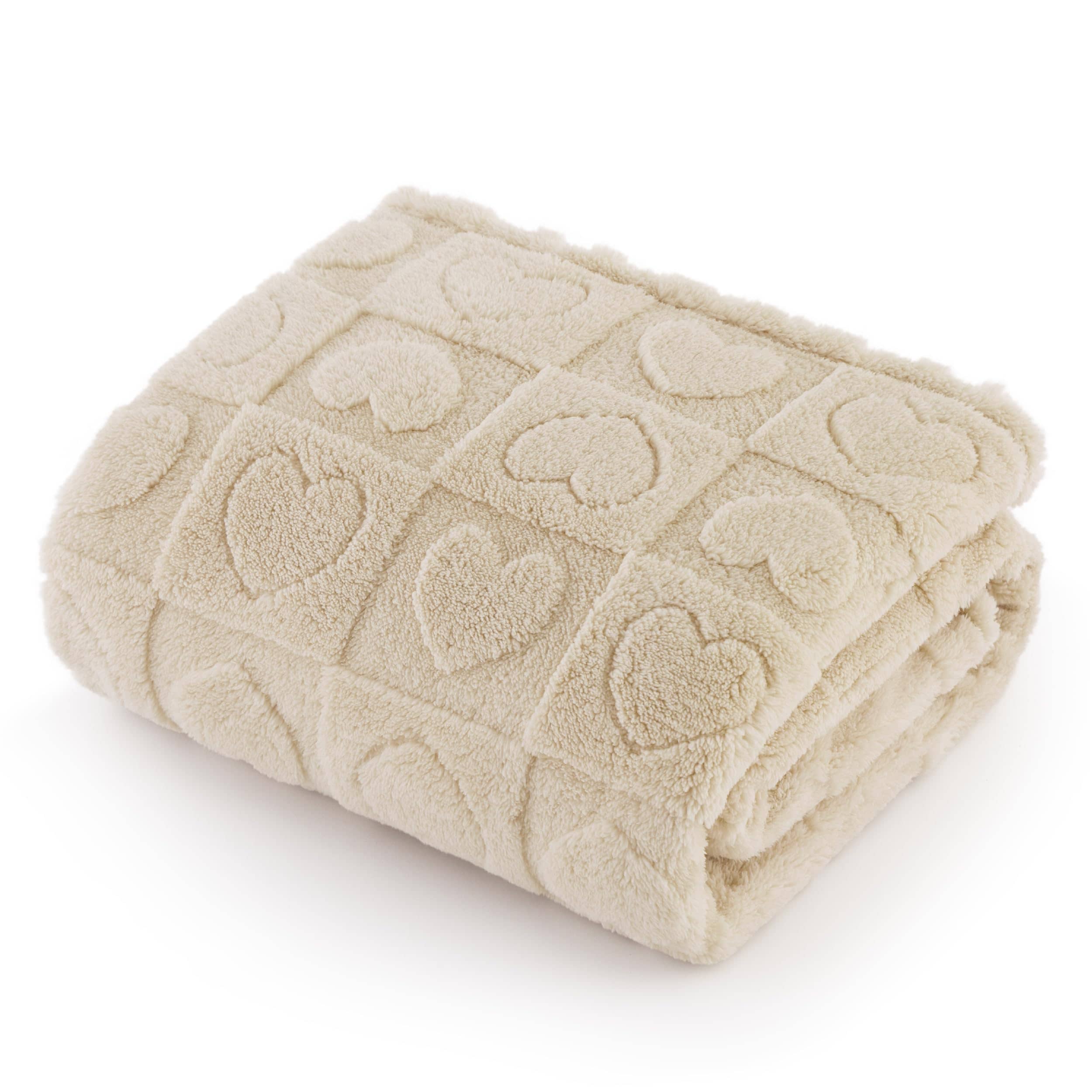 Beige Jacquard fleece pet blanket folded, displaying raised heart pattern and plush texture for furniture protection.