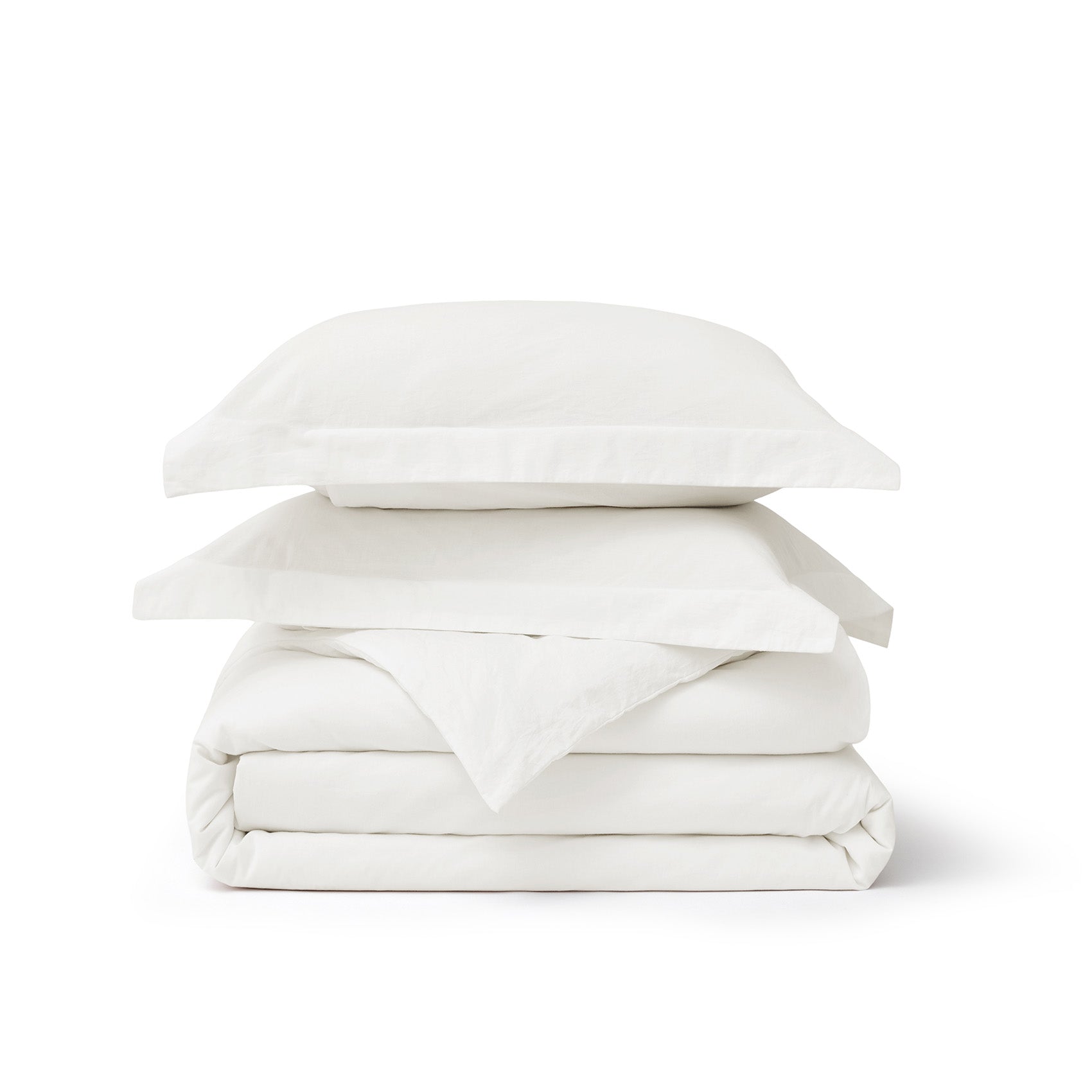 White GentleSoft washed cotton duvet cover set and pillow shams stacked, showing soft texture on product page.